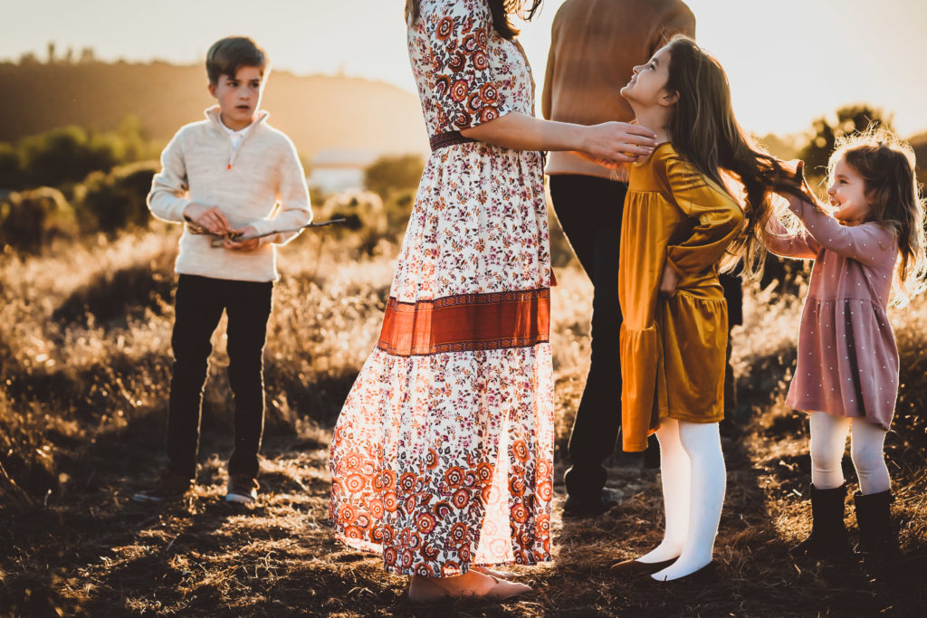Mom wearing dress with kids for photo session