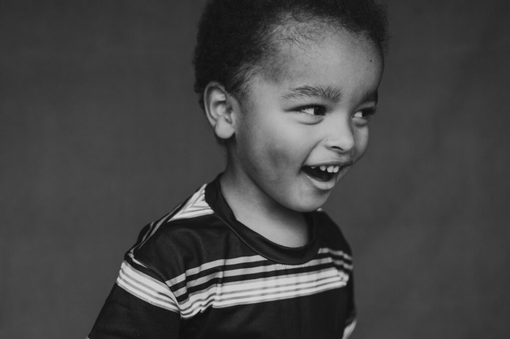 Little boy smiling during fine art school photos session | Love Michelle Photography 