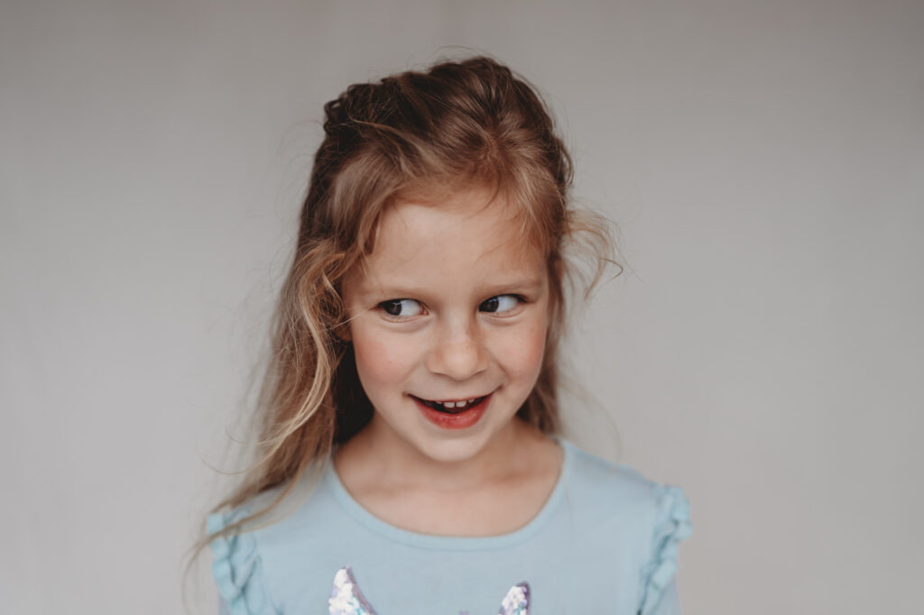 Little girl smiling during fine art school photography session | Love Michelle Photography