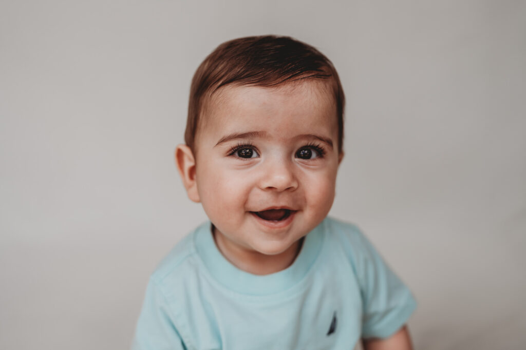 Little boy smiling during fine art school photos session | Love Michelle Photography 