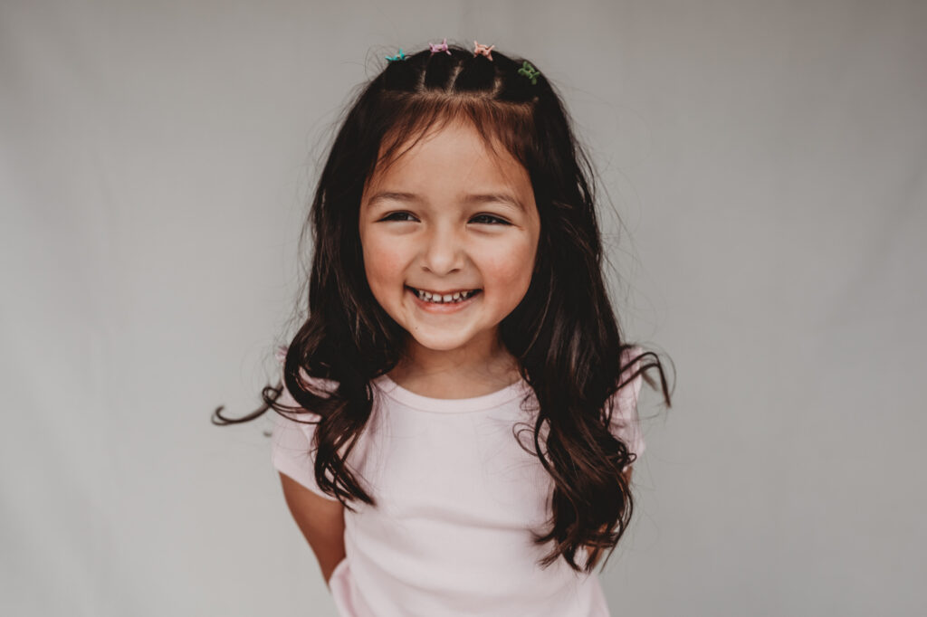 Little girl smiling during fine art school photos session | Love Michelle Photography 