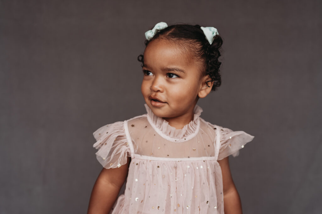 Little girl smiling during fine art school photos session | Love Michelle Photography 