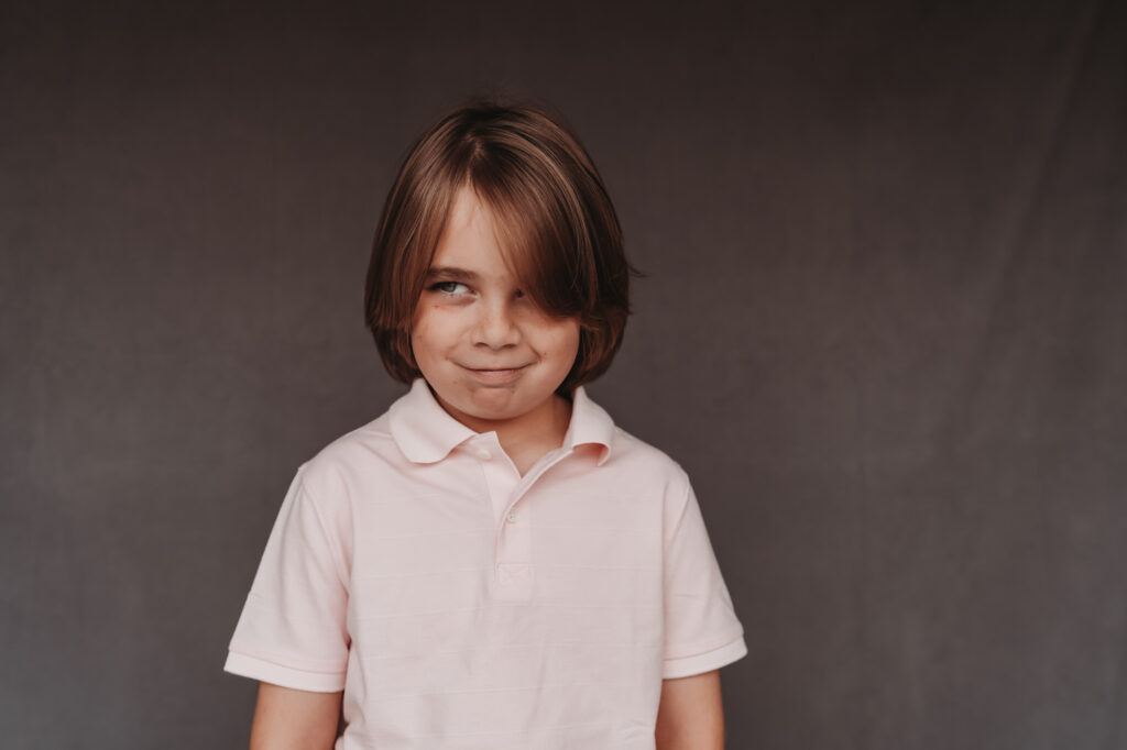 Little kid smiling during fine art school photography session | Love Michelle Photography