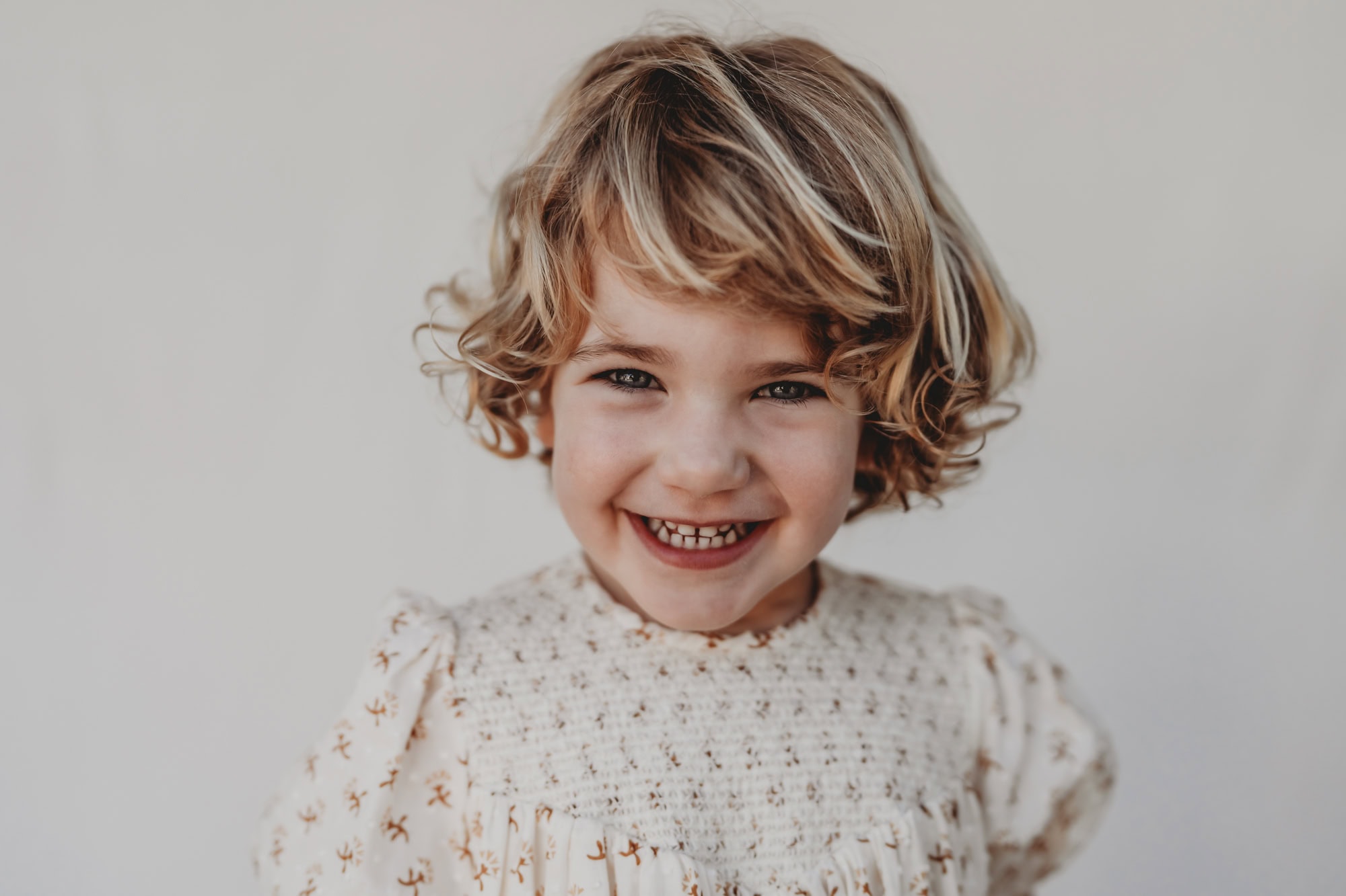 Natural, expressive child portrait created for a San Diego Montessori school. Authentic school photography that reflects each child’s personality without forced posing.